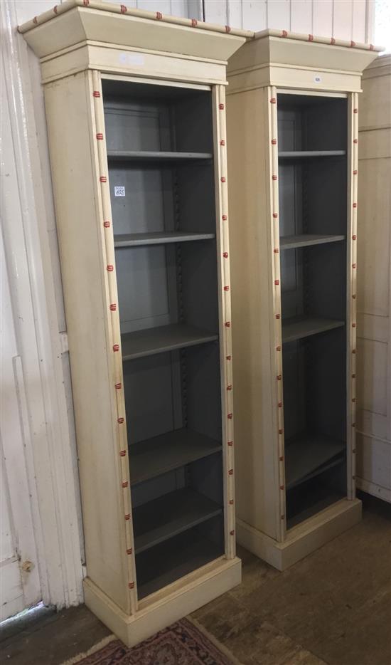 Pair of slim painted bookcases